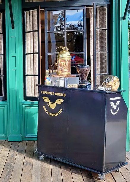 The Espresso Subito mobile cart with The Dome, set up outdoors