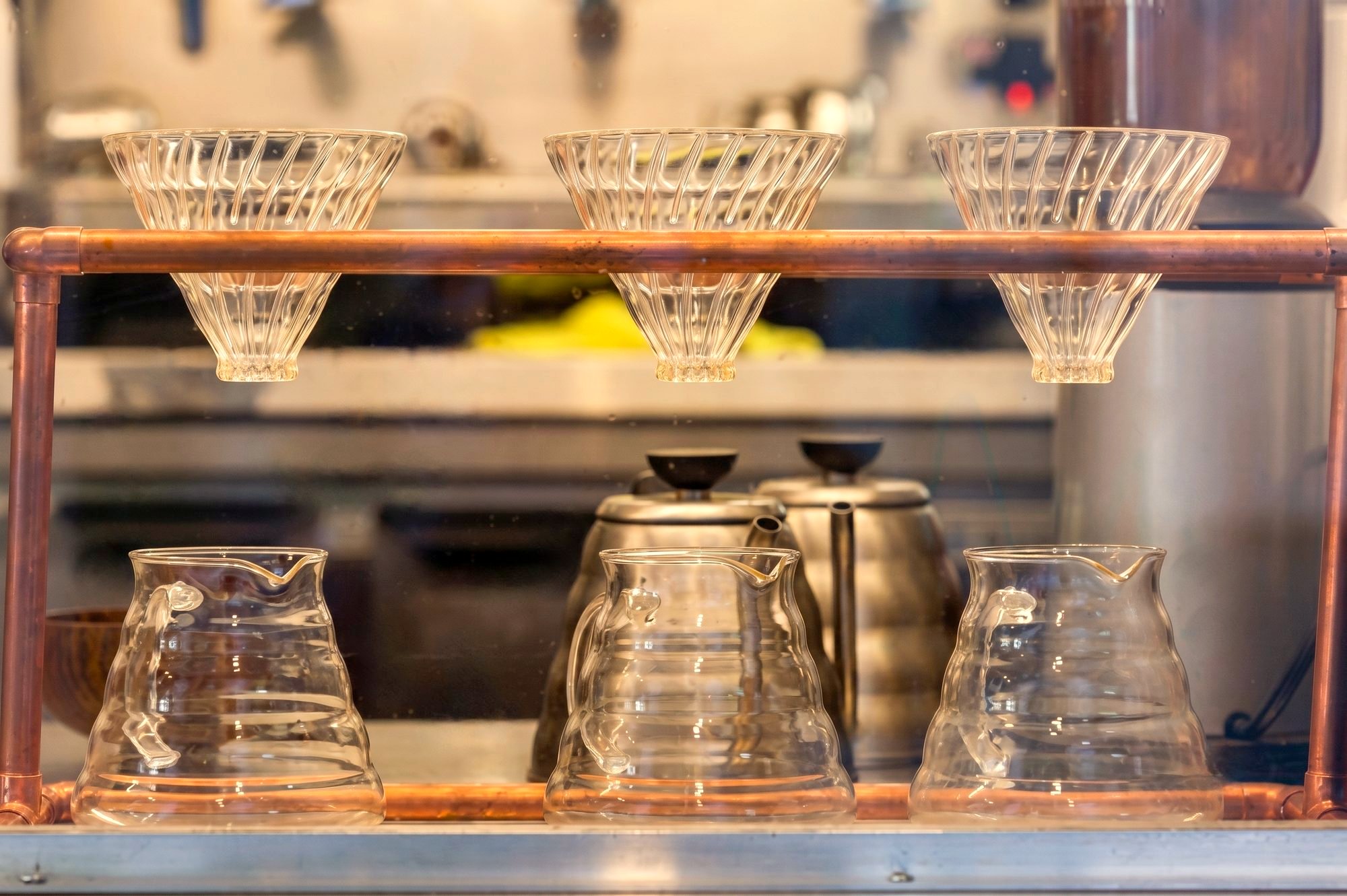A barista pouring coffee service at an Espresso Subito event